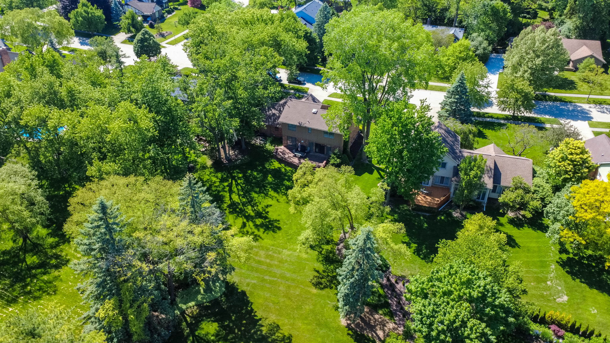 Aerial view of the home and lot