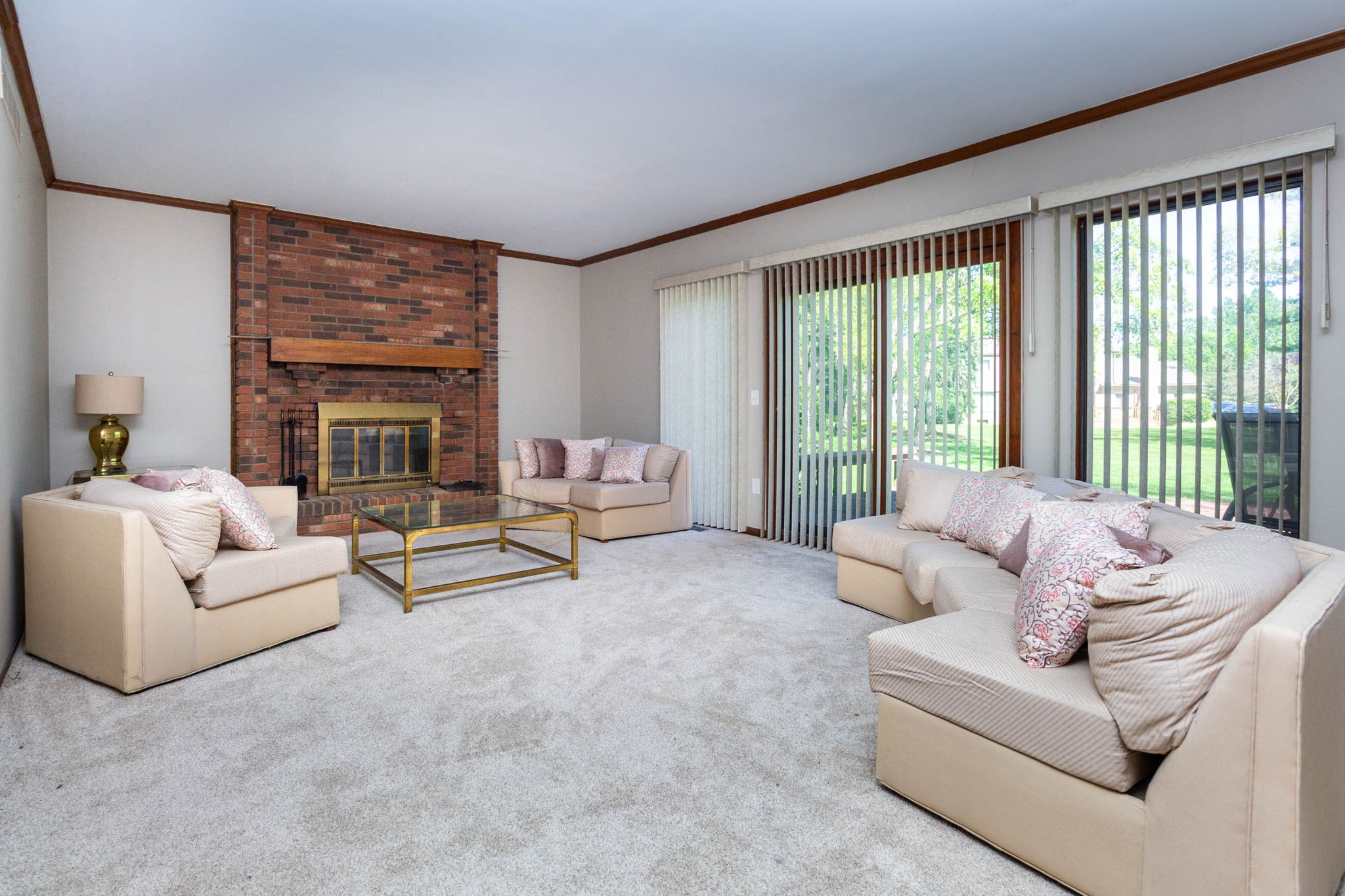Greatroom with wood-burning brick fireplace