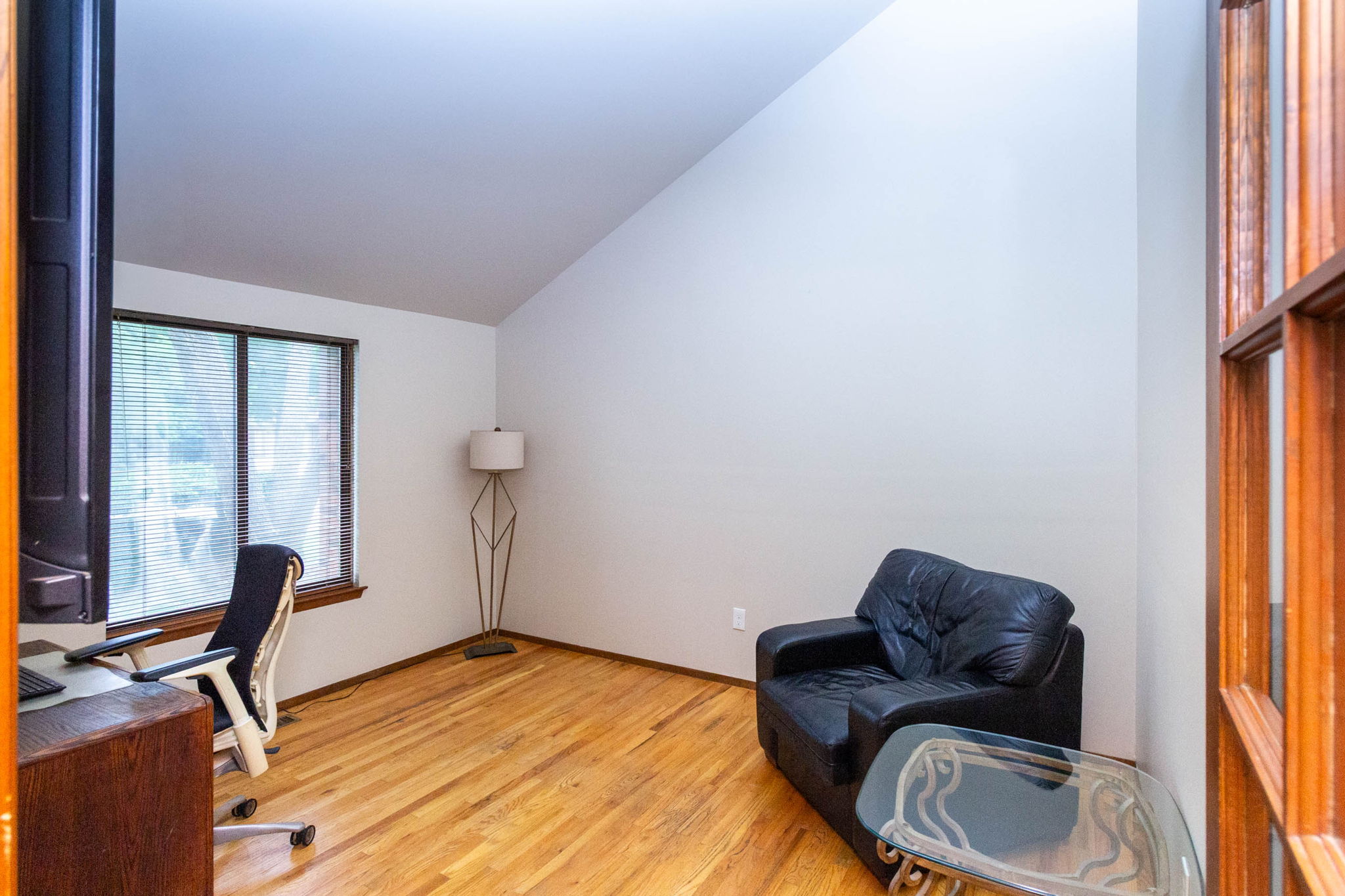 Office or den with vaulted ceiling