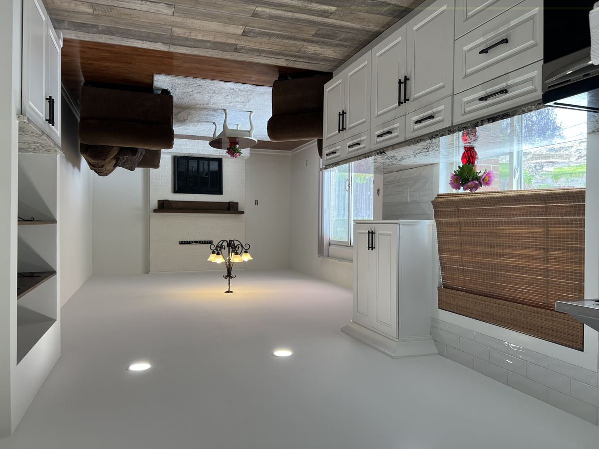 Open concept kitchen to family room with wood burning fireplace
